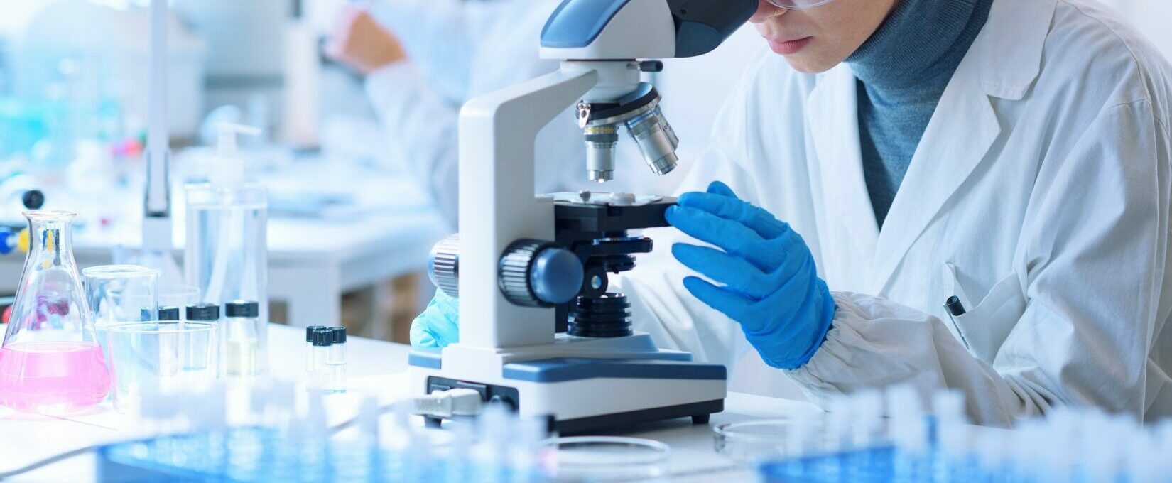 Girl exploring a substance in a lab